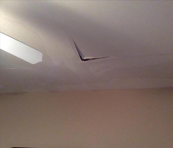 ceiling hole from water leak